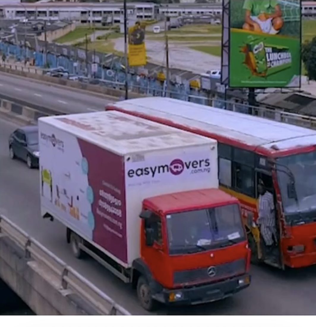 An EasyMovers branded truck on an expressway in Lagos